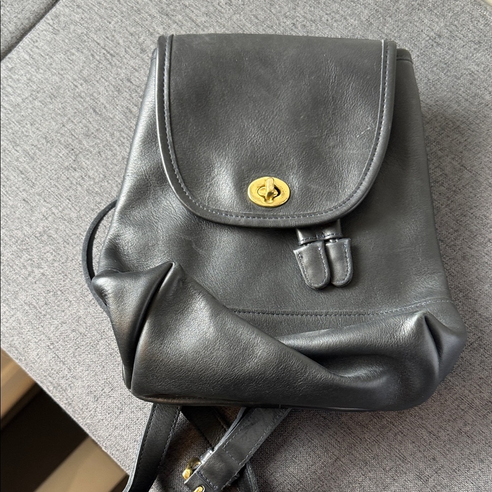 Black Leather Backpack with Gold Clasp